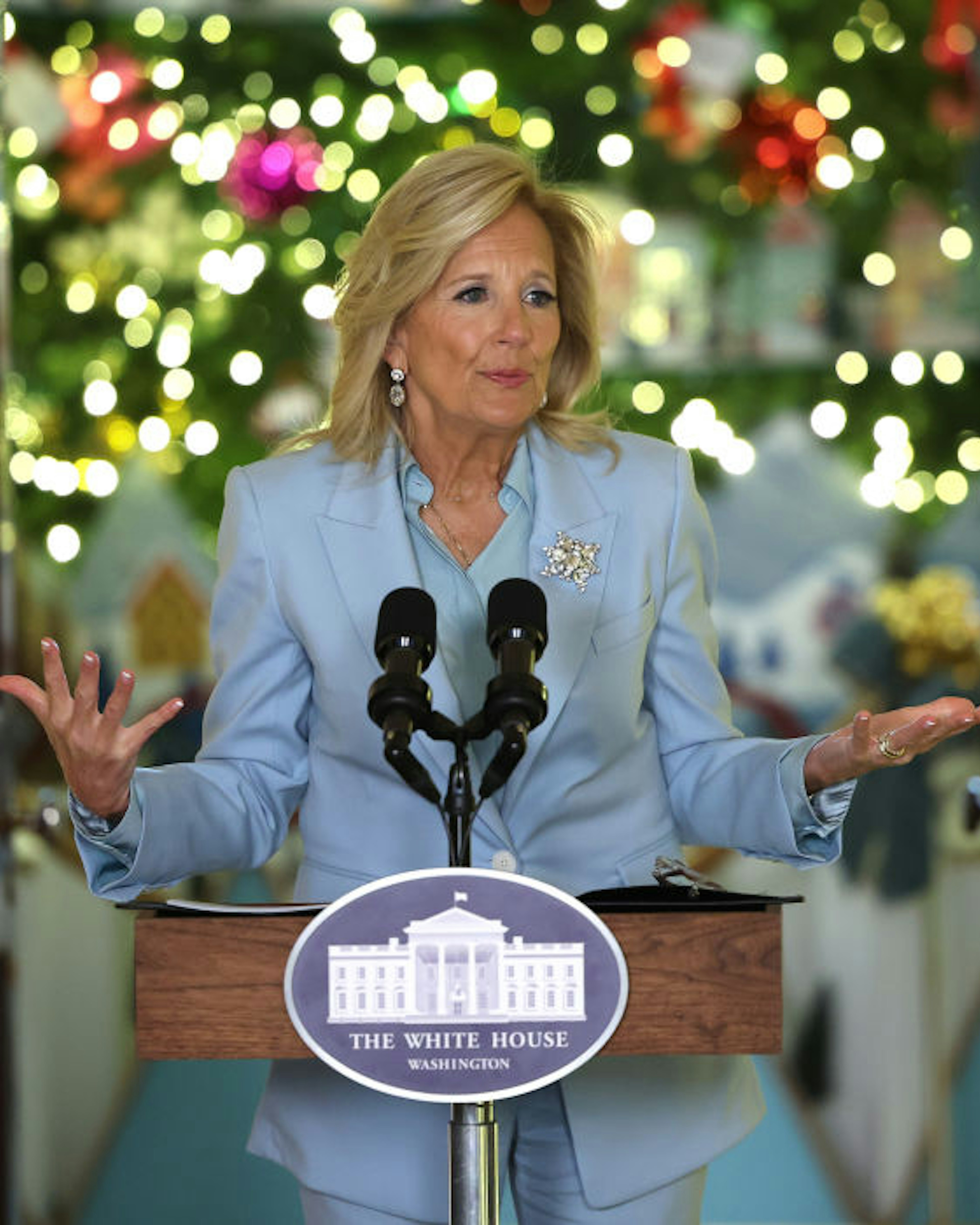 WASHINGTON, DC - NOVEMBER 27: First lady Jill Biden speaks about the holiday season and unveils the White House holiday decor while thanking volunteers who helped set it up, at the White House on November 27, 2023 in Washington, DC. The theme for this year's White House decorations is “Magic, Wonder and Joy,” and is designed to capture the “delight and imagination of childhood.” The White House expects to welcome approximately 100,000 visitors during the holiday season. (Photo by Kevin Dietsch/Getty Images)