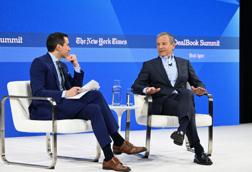 NEW YORK, NEW YORK - NOVEMBER 29: (L-R) Andrew Ross Sorkin and Robert Iger speak onstage during The New York Times Dealbook Summit 2023 at Jazz at Lincoln Center on November 29, 2023 in New York City. (Photo by Slaven Vlasic/Getty Images for The New York Times)