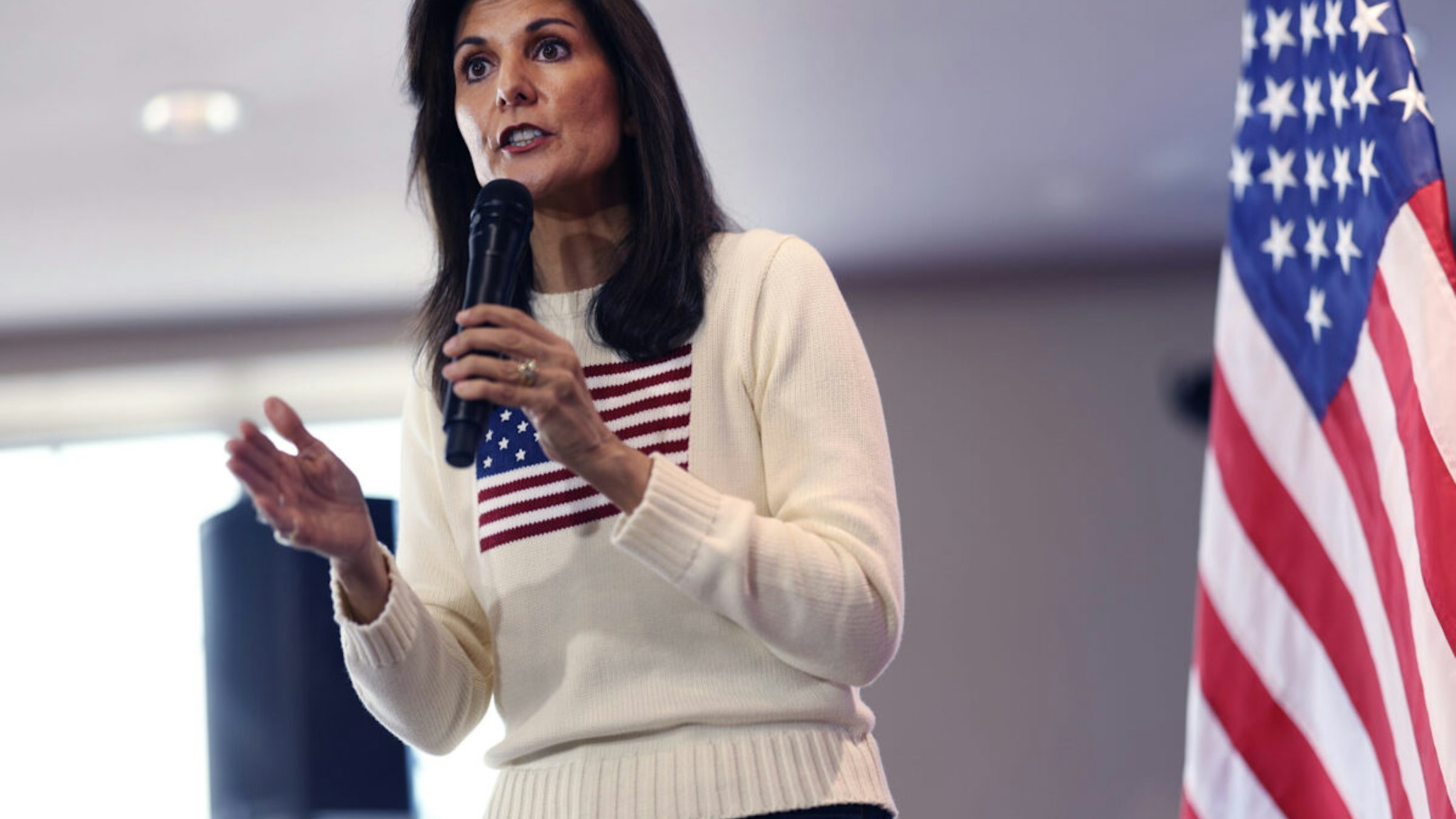 NEVADA, IOWA - DECEMBER 18: Republican presidential candidate former U.N. Ambassador Nikki Haley addresses the crowd during a campaign stop at the Nevada Fairgrounds community building on December 18, 2023 in Nevada, Iowa. Iowa Republicans will be the first to select their party's nominee for the 2024 presidential race when they go to caucus on January 15, 2024.