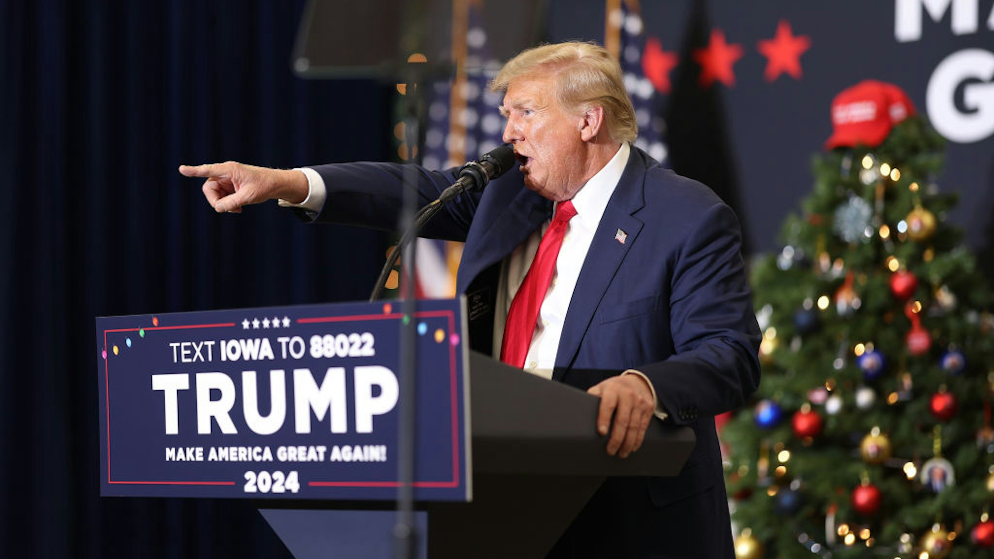 WATERLOO, IOWA - DECEMBER 19: Republican presidential candidate and former U.S. President Donald Trump speaks at a campaign event on December 19, 2023 in Waterloo, Iowa. Iowa Republicans will be the first to select their party's nomination for the 2024 presidential race, when they go to caucus on January 15, 2024.