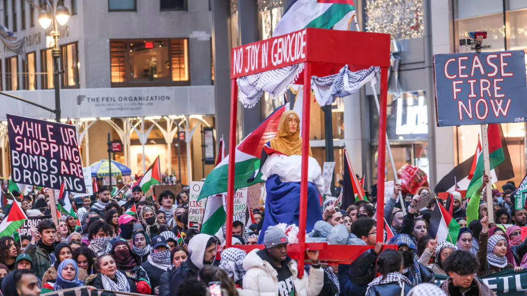 ‘Christmas Is Canceled’: Six Arrested, Officer Injured During Pro-Palestinian Protests In NYC On Christmas