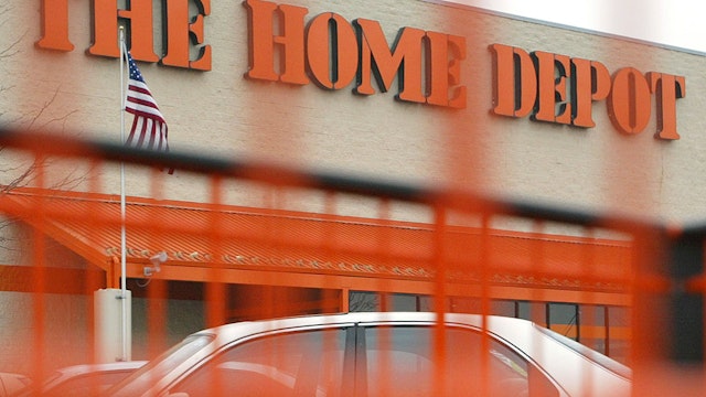 MOUNT PROSPECT, IL - FEBRUARY 19: A Home Depot sign is seen through one of its orange shopping carts February 19, 2004 in Mount Prospect, Illinois. Home Depot, the world's largest home improvement retailer, will announce its 4th Quarter and Fiscal Year 2003 Earnings February 24, 2004. (Photo by Tim Boyle/Getty Images)