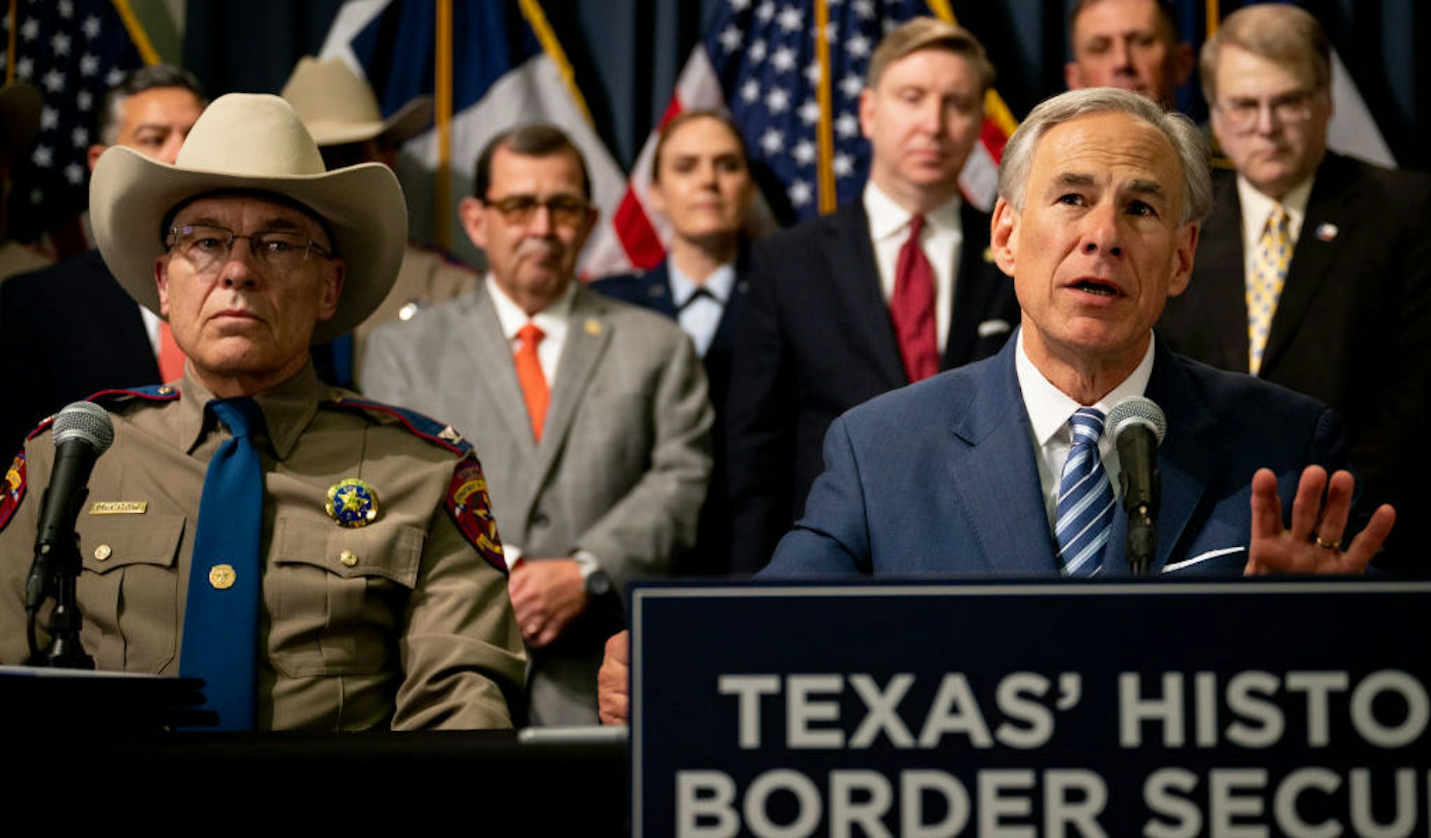 Texas Gov. Greg Abbott speaks as Texas Department of Public Safety Director Steve McCraw and elected officials look on at a news conference at the state Capitol on June 08, 2023 in Austin, Texas. (Photo by Brandon Bell/Getty Images)