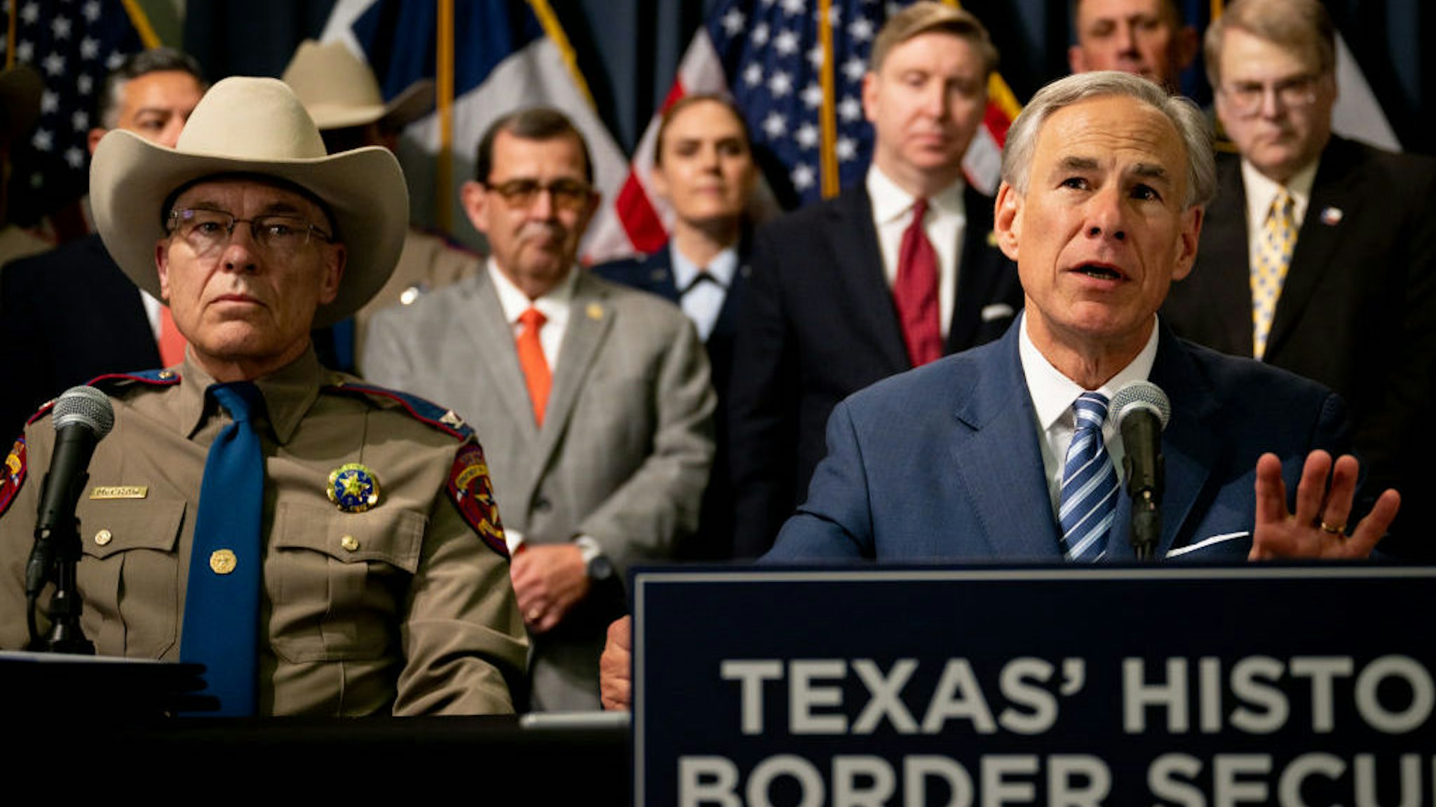 Texas Gov. Greg Abbott speaks as Texas Department of Public Safety Director Steve McCraw and elected officials look on at a news conference at the state Capitol on June 08, 2023 in Austin, Texas. (Photo by Brandon Bell/Getty Images)