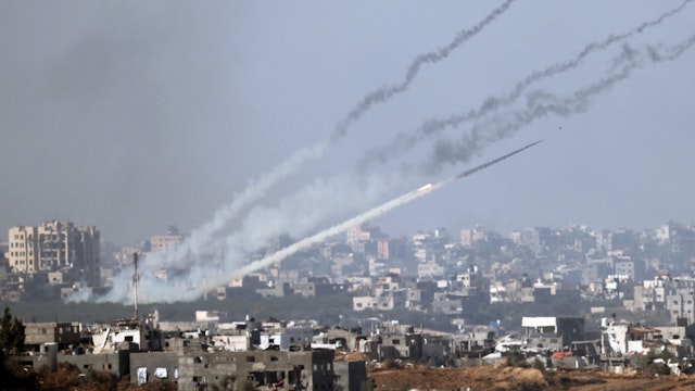 This picture taken from southern Israel near the border with the Gaza Strip shows a rocket being fired from inside Gaza towards Israel, as battles resumed between the Israeli forces and Hamas militants, on December 1, 2023. A temporary truce between Israel and Hamas expired on December 1, with the Israeli army saying combat operations had resumed, accusing Hamas of violating the operational pause.