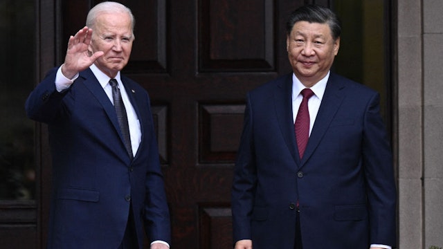TOPSHOT - US President Joe Biden greets Chinese President Xi Jinping before a meeting during the Asia-Pacific Economic Cooperation (APEC) Leaders' week in Woodside, California on November 15, 2023. Biden and Xi will try to prevent the superpowers' rivalry spilling into conflict when they meet for the first time in a year at a high-stakes summit in San Francisco on Wednesday. With tensions soaring over issues including Taiwan, sanctions and trade, the leaders of the world's largest economies are expected to hold at least three hours of talks at the Filoli country estate on the city's outskirts. (Photo by Brendan SMIALOWSKI / AFP) (Photo by BRENDAN SMIALOWSKI/AFP via Getty Images)