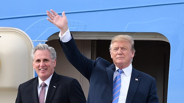 U.S. President Donald Trump (R) and U.S. House Minority Leader Kevin McCarthy arrive in Air Force One at LAX Airport on April 5, 2019 in Los Angeles, California