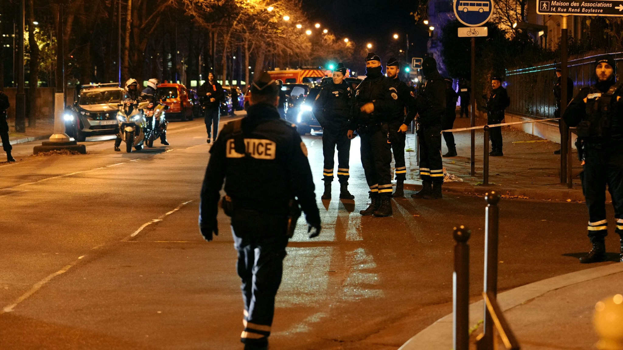 Police officers stand guard in a security perimetre set after one person was killed and two others wounded in a knife attack in Paris, on December 2, 2023. The person suspected of stabbing to death a man and wounding two others in Paris on Saturday is known to follow radical Islam and has mental illness, a French police source told AFP.