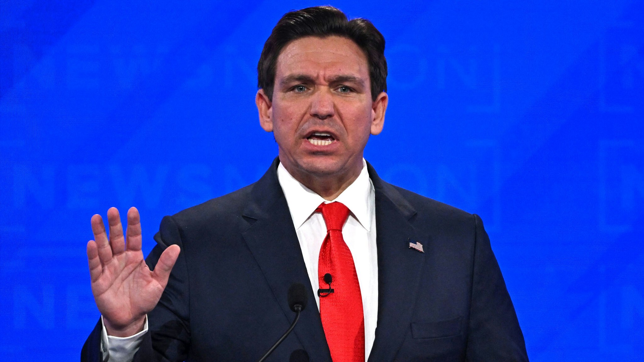 Florida Governor Ron DeSantis gestures as he speaks during the fourth Republican presidential primary debate at the University of Alabama in Tuscaloosa, Alabama, on December 6, 2023.