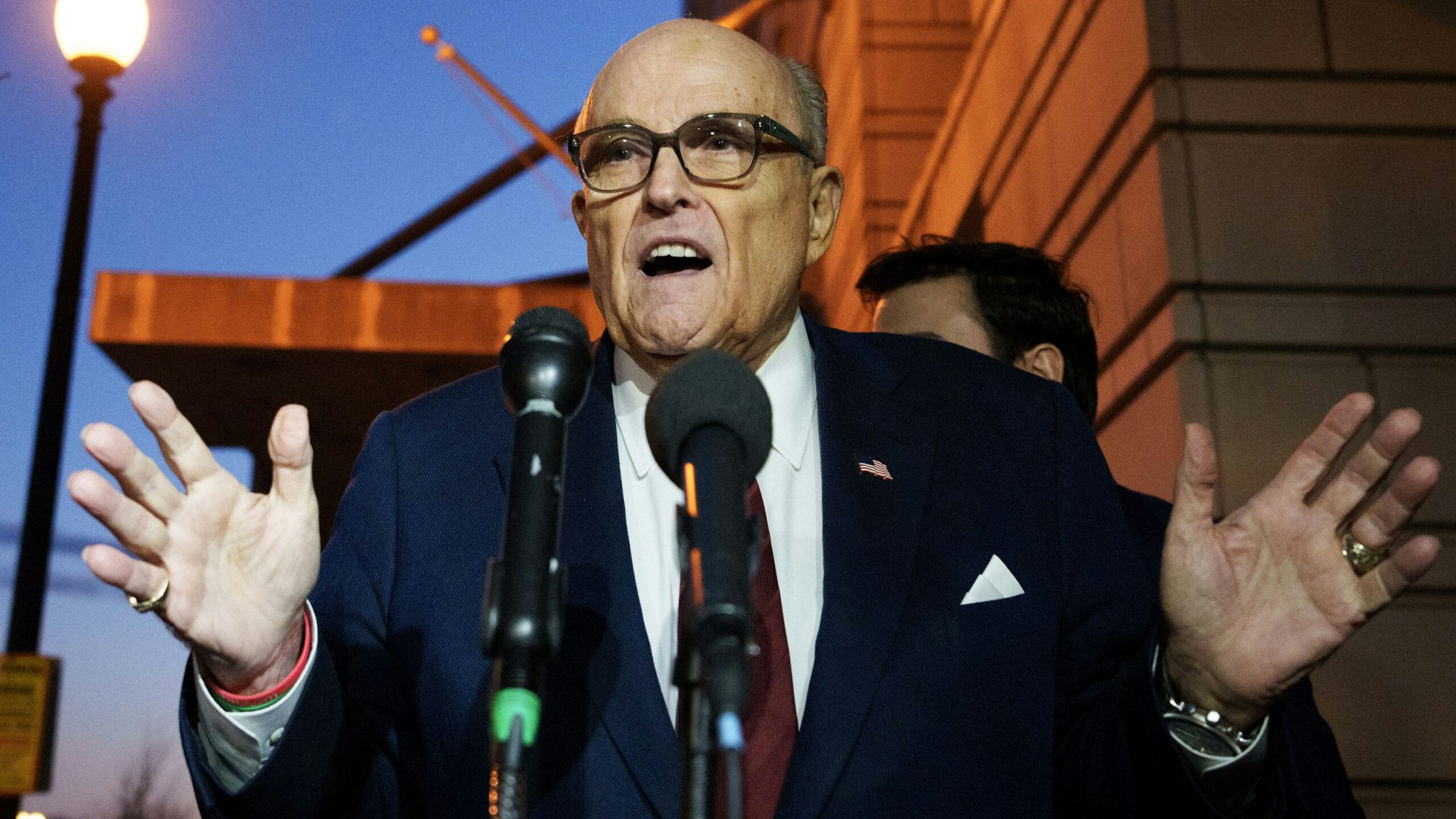 WASHINGTON, DC - DECEMBER 11: Rudy Giuliani, the former personal lawyer for former U.S. President Donald Trump, speaks to the press as he leaves the E. Barrett Prettyman U.S. District Courthouse on December 11, 2023 in Washington, DC. Jury selection and opening arguments started today in his defamation jury trial brought by Fulton County election workers Ruby Freeman and Shaye Moss, who successfully sued Giuliani in civil court.