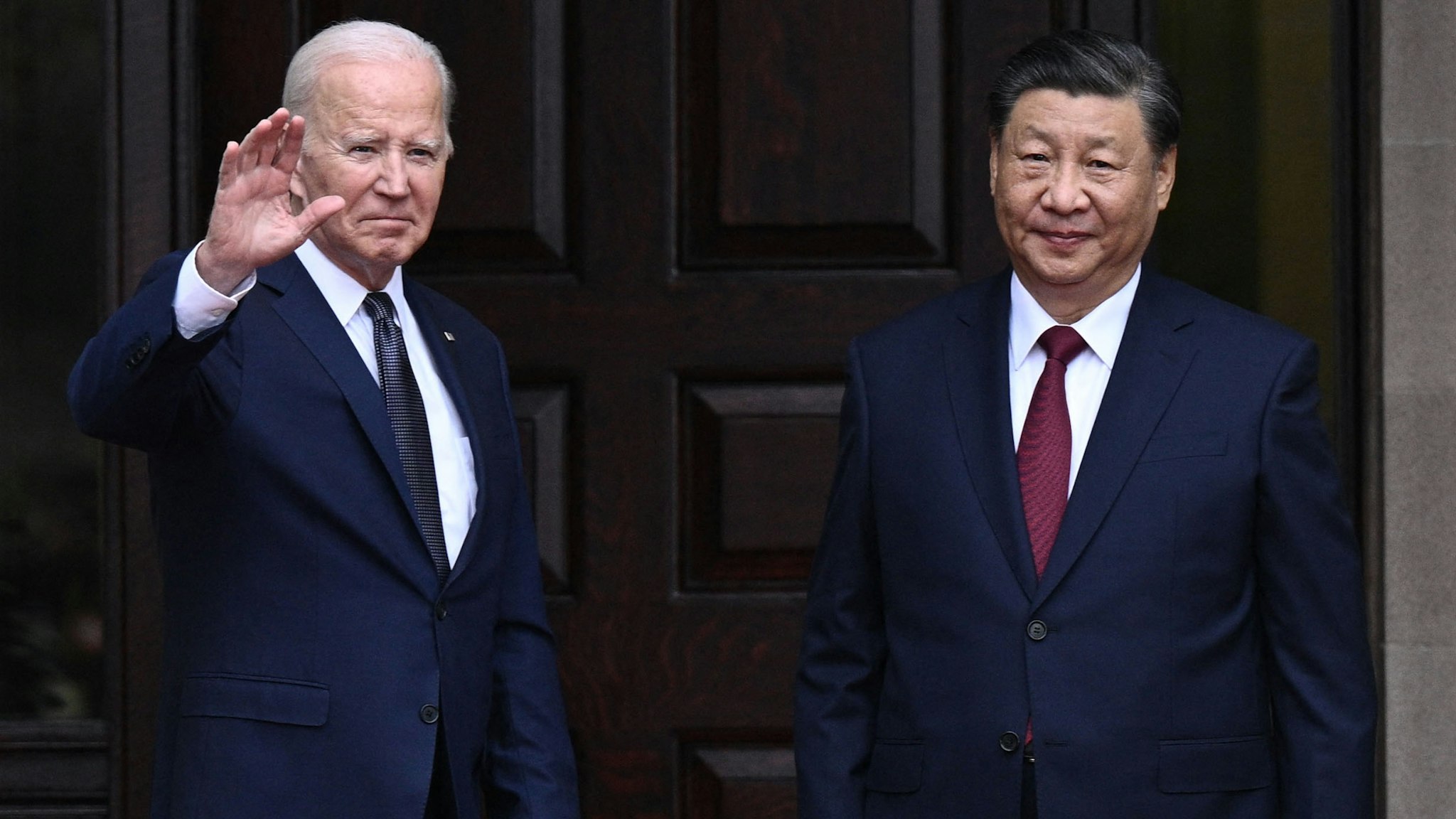 TOPSHOT - US President Joe Biden greets Chinese President Xi Jinping before a meeting during the Asia-Pacific Economic Cooperation (APEC) Leaders' week in Woodside, California on November 15, 2023. Biden and Xi will try to prevent the superpowers' rivalry spilling into conflict when they meet for the first time in a year at a high-stakes summit in San Francisco on Wednesday. With tensions soaring over issues including Taiwan, sanctions and trade, the leaders of the world's largest economies are expected to hold at least three hours of talks at the Filoli country estate on the city's outskirts.