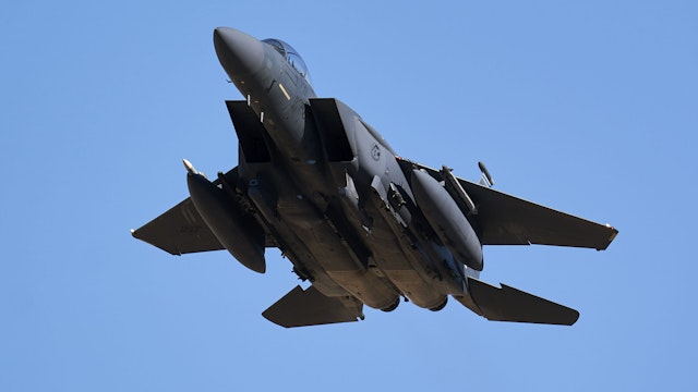 ALBACETE, CASTILLA-LA MANCHA, SPAIN - FEBRUARY 22: A U.S. Boeing F-15 Strike Eagle aircraft performs combat air maneuvers in the vicinity of Los Llanos air base, Feb. 22, 2022, in Albacete, Castilla-La Mancha, Spain. The maneuvers are conducted during one of the NATO Tactical Leadership Program (TLP) courses, better known as NATO Pilot School. Currently, the TLP organization is made up of ten NATO countries: Belgium, Denmark, France, Germany, Greece, Holland, England, Italy, Spain and the United States, although other nations also participate by contracting their assistance. The pilots take advantage of these practices to prepare themselves for a possible war in Ukraine.