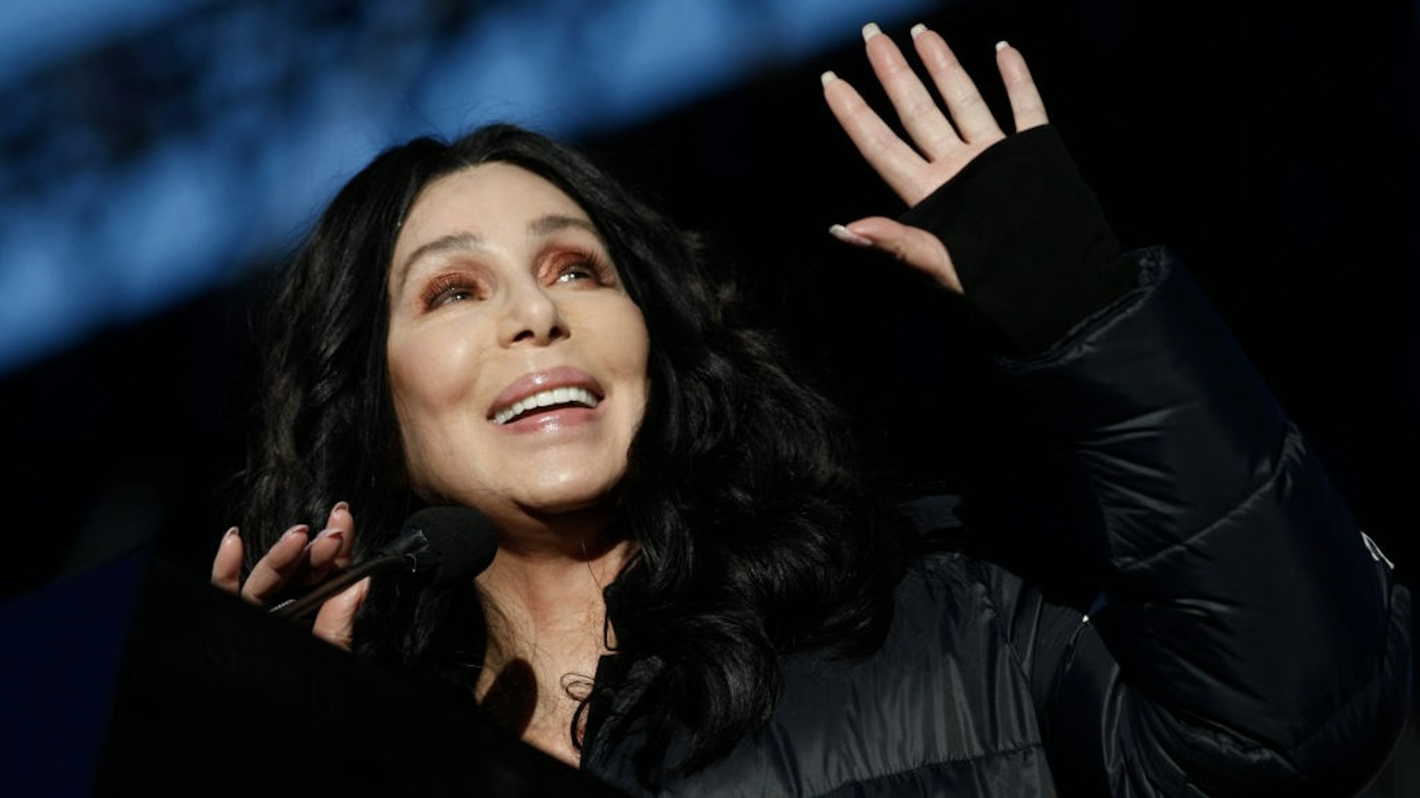 Singer/actress Cher speaks during the Women's March "Power to the Polls" voter registration tour launch at Sam Boyd Stadium on January 21, 2018, in Las Vegas, Nevada.