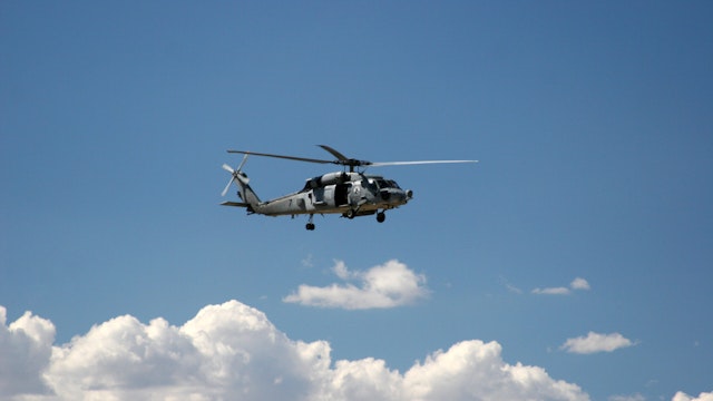 SH-60 Navy Seahawk helicopter conducting high altitude training operations.