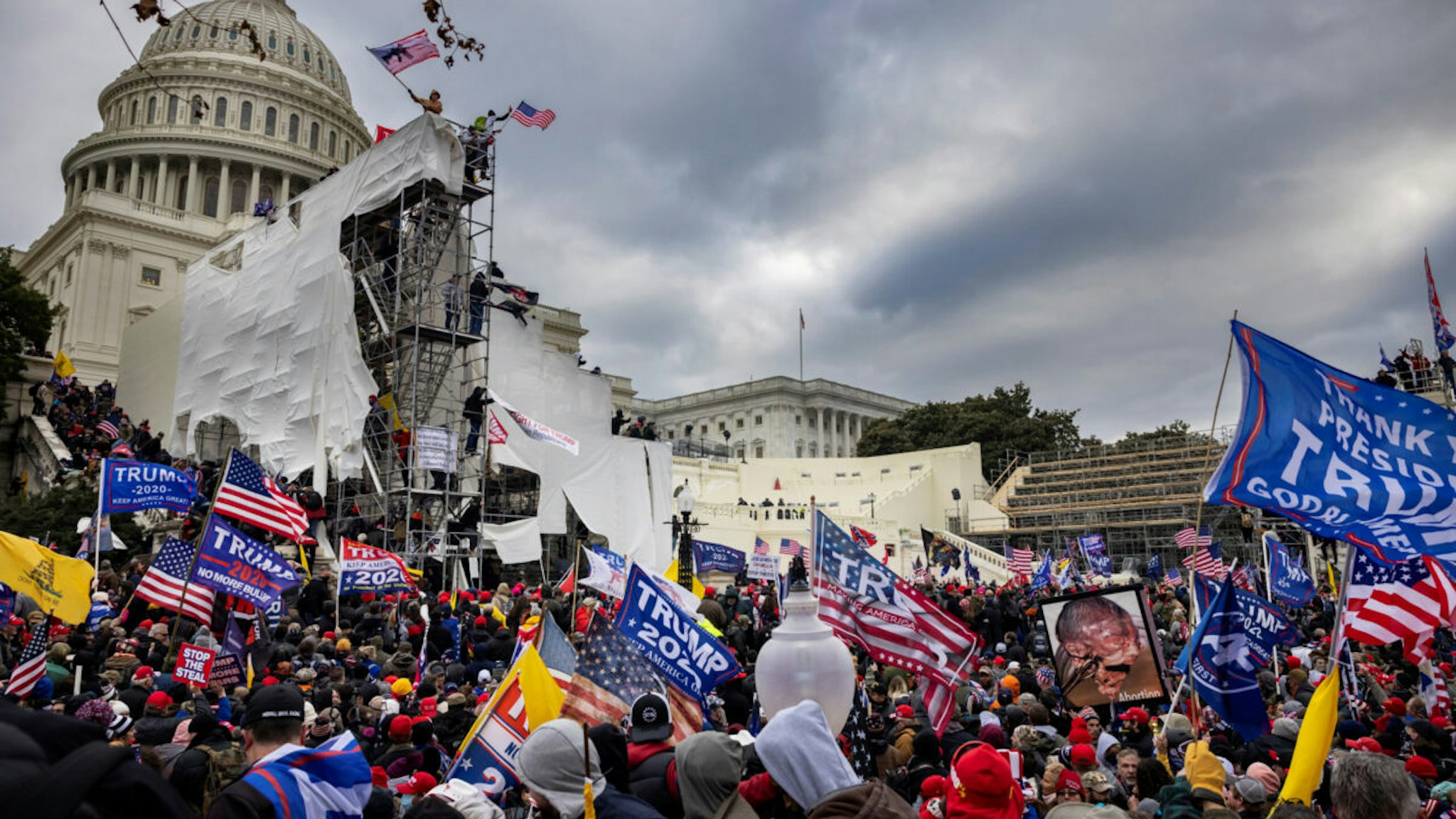 WASHINGTON, DC - JANUARY 6: Trump supporters clash with police and security forces as people try to storm the US Capitol on January 6, 2021 in Washington, DC. Demonstrators breeched security and entered the Capitol as Congress debated the 2020 presidential election Electoral Vote Certification.