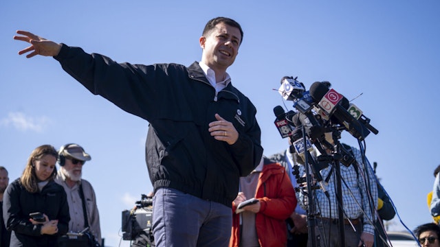 U.S. Transportation Secretary Pete Buttigieg delivers remarks to the press as he visited the site of the Norfolk Southern train derailment on February 23, 2023 in East Palestine, Ohio.