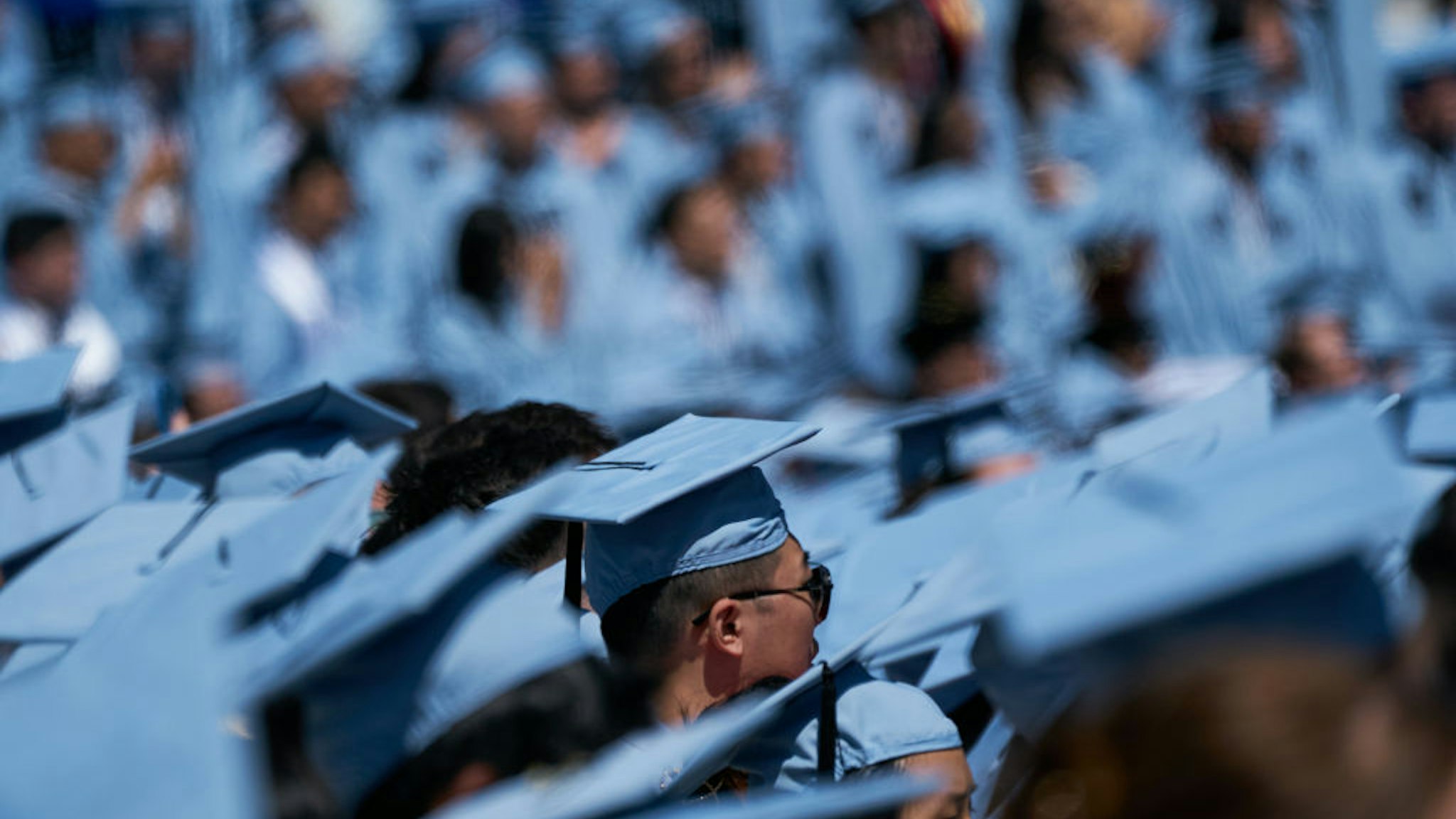 Graduates during the Columbia University commencement convocation in New York, US, on Wednesday, May 17, 2023. The university offers undergraduate and graduate degrees in arts and sciences, business, dentistry, education, engineering, law, medicine, nursing, pharmacy, and social work. Photographer: Bing Guan/Bloomberg via Getty Images