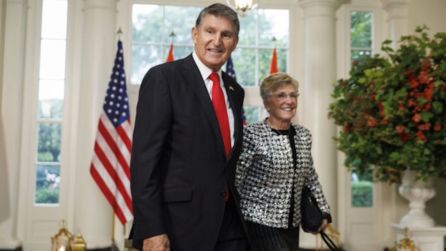 Senator Joe Manchin, a Democrat from West Virginia, left, and Gayle Manchin arrive to attend a state dinner in honor of Indian Prime Minister Narendra Modi hosted by US President Joe Biden and First Lady Jill Biden at the White House in Washington, DC, US, on Thursday, June 22, 2023.