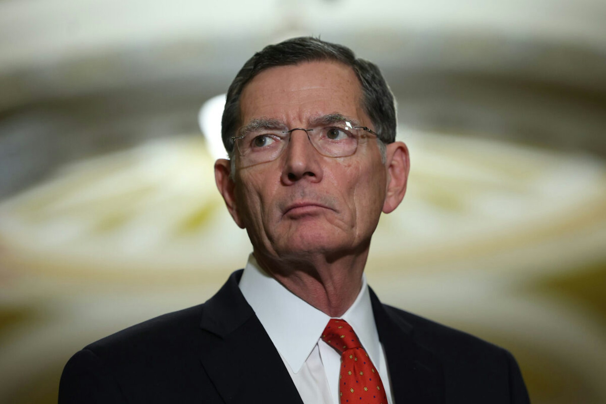 WASHINGTON, DC - DECEMBER 06: U.S. Sen. John Barrasso (R-WY) speaks to reporters following the Senate weekly policy luncheons, at the U.S. Capitol on December 06, 2022 in Washington, DC. Congress is working on passing the annual defense spending bill before funding runs out by the end of the year.