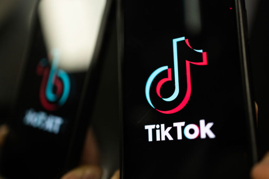 LONDON, ENGLAND - FEBRUARY 28: In this illustration, the TikTok logo is displayed on an iPhone on February 28, 2023 in London, England.  This week, the US government and the European Union Parliament announced a ban on installing the popular social media app on employee devices.  (Photo by Dan Kitwood/Getty Images)