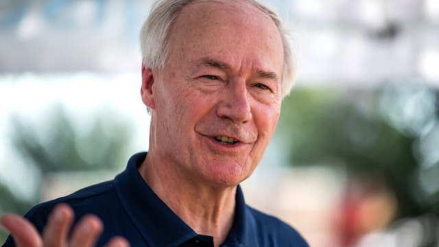 Asa Hutchinson, former governor of Arkansas and 2024 Republican presidential candidate, speaks to reporters at the Des Moines Register political soapbox during the Iowa State Fair in Des Moines, Iowa, US, on Saturday, Aug. 19, 2023.