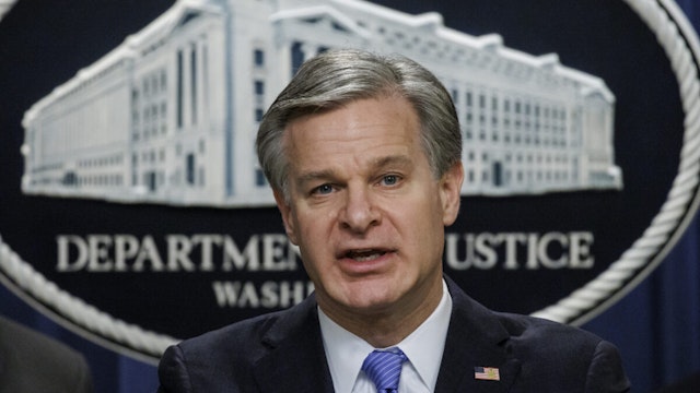 FBI Director Christopher Wray speaks during a press conference at the U.S. Department of Justice on December 6, 2023 in Washington, DC.
