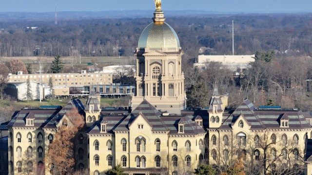 SOUTH BEND, INDIANA - DECEMBER 07: The main building and Golden Dome on the campus of Notre Dame Universityon December 07, 2023 in South Bend, Indiana.