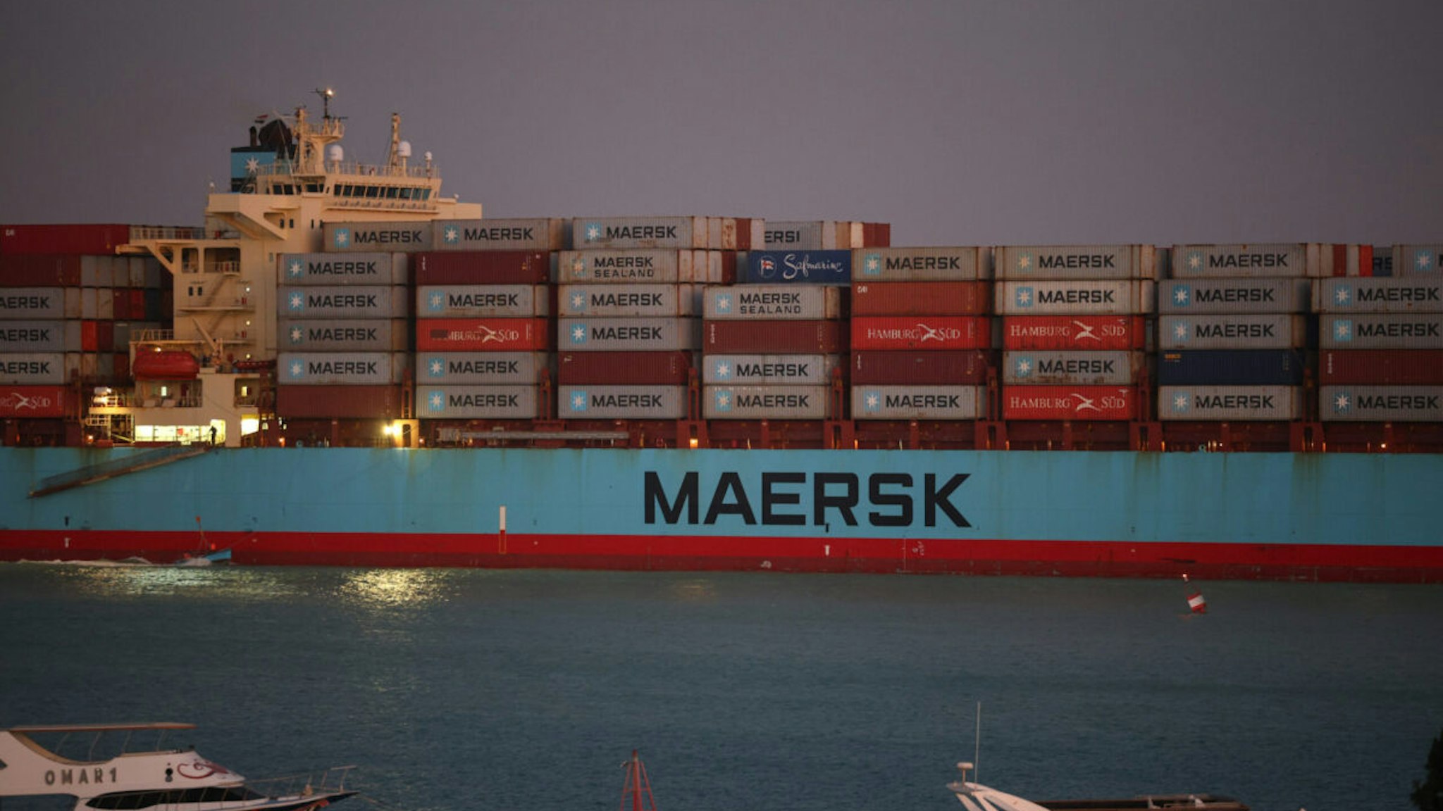 The Maersk Sentosa container ship sails southbound to exit the Suez Canal in Suez, Egypt, on Thursday, Dec. 21, 2023.