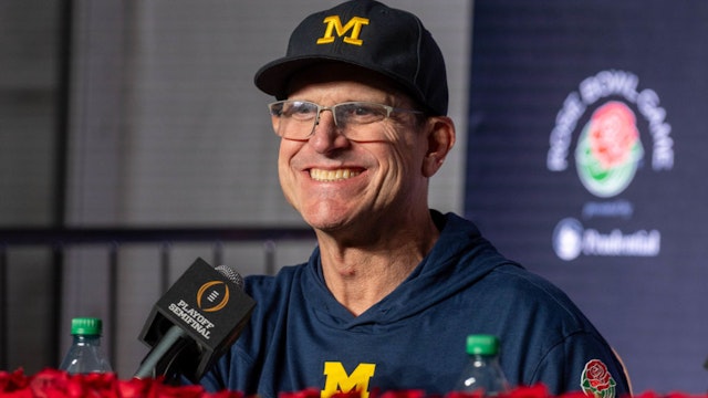 PASADENA, CALIFORNIA - JANUARY 01: Head Coach Jim Harbaugh of the Michigan Wolverines speaks to media during the post game press conference after the CFP Semifinal Rose Bowl Game against the Alabama Crimson Tide at Rose Bowl Stadium on January 01, 2024 in Pasadena, California. The Michigan Wolverines won the game 27-20 in overtime. (Photo by Aaron J. Thornton/Getty Images)
