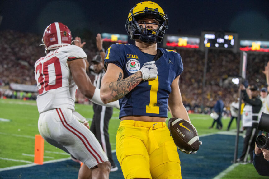 PASADENA, CALIFORNIA - JANUARY 01: Roman Wilson #1 of the Michigan Wolverines reacts after he scores a touchdown during the second half of the CFP Semifinal Rose Bowl Game against the Alabama Crimson Tide at Rose Bowl Stadium on January 01, 2024 in Pasadena, California. The Michigan Wolverines won the game 27-20 in overtime. (Photo by Aaron J. Thornton/Getty Images)