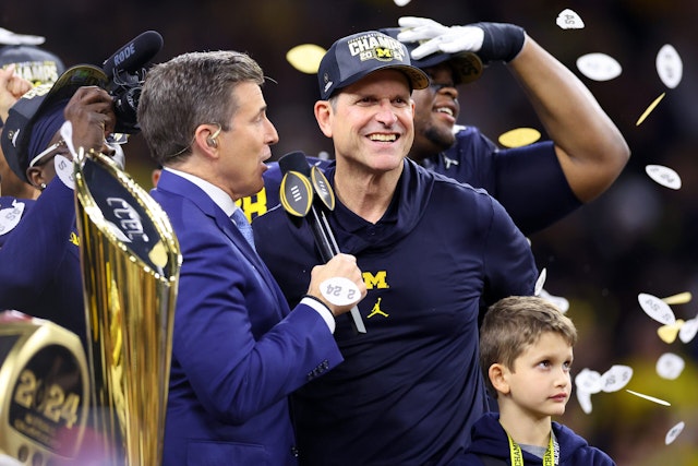 HOUSTON, TEXAS - JANUARY 08: Head coach Jim Harbaugh of the Michigan Wolverines celebrates after defeating the Washington Huskies during the 2024 CFP National Championship game at NRG Stadium on January 08, 2024 in Houston, Texas. Michigan defeated Washington 34-13. (Photo by Stacy Revere/Getty Images)