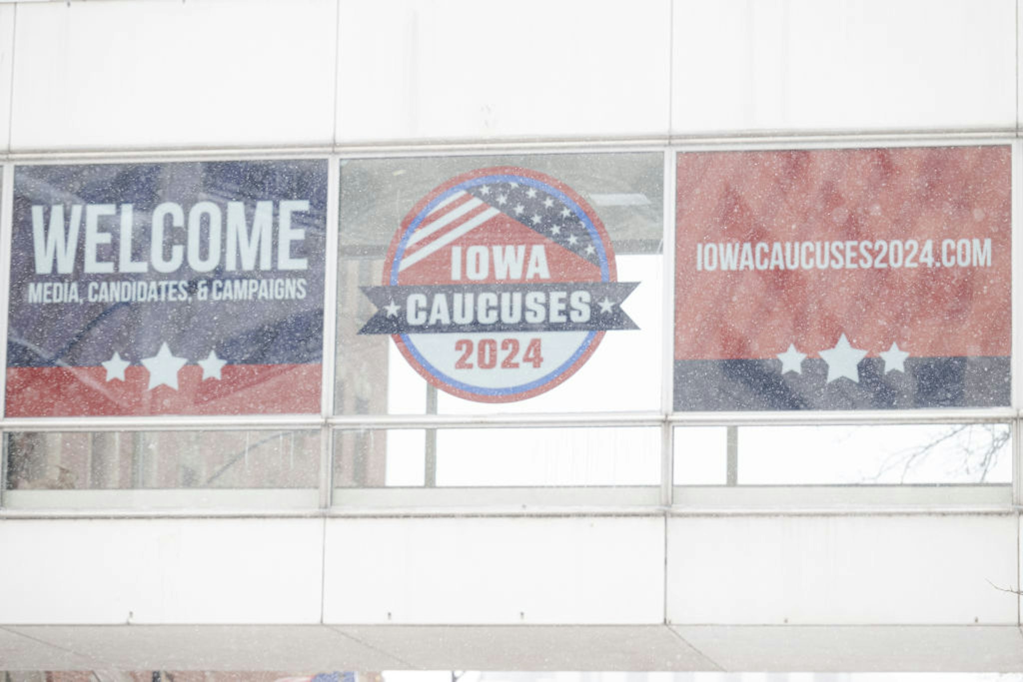 Signage ahead of the Iowa caucus in Des Moines, Iowa, US, on Friday, Jan. 12, 2024. The polar vortex is about to unleash an Arctic chill across much of the US this weekend, leaving football fans shivering in the Midwest and inflicting subzero temperatures on Iowa voters just before the state's caucus begins.
