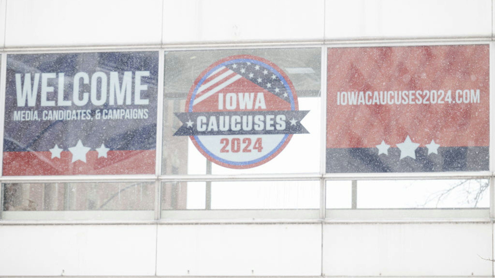 Signage ahead of the Iowa caucus in Des Moines, Iowa, US, on Friday, Jan. 12, 2024. The polar vortex is about to unleash an Arctic chill across much of the US this weekend, leaving football fans shivering in the Midwest and inflicting subzero temperatures on Iowa voters just before the state's caucus begins.