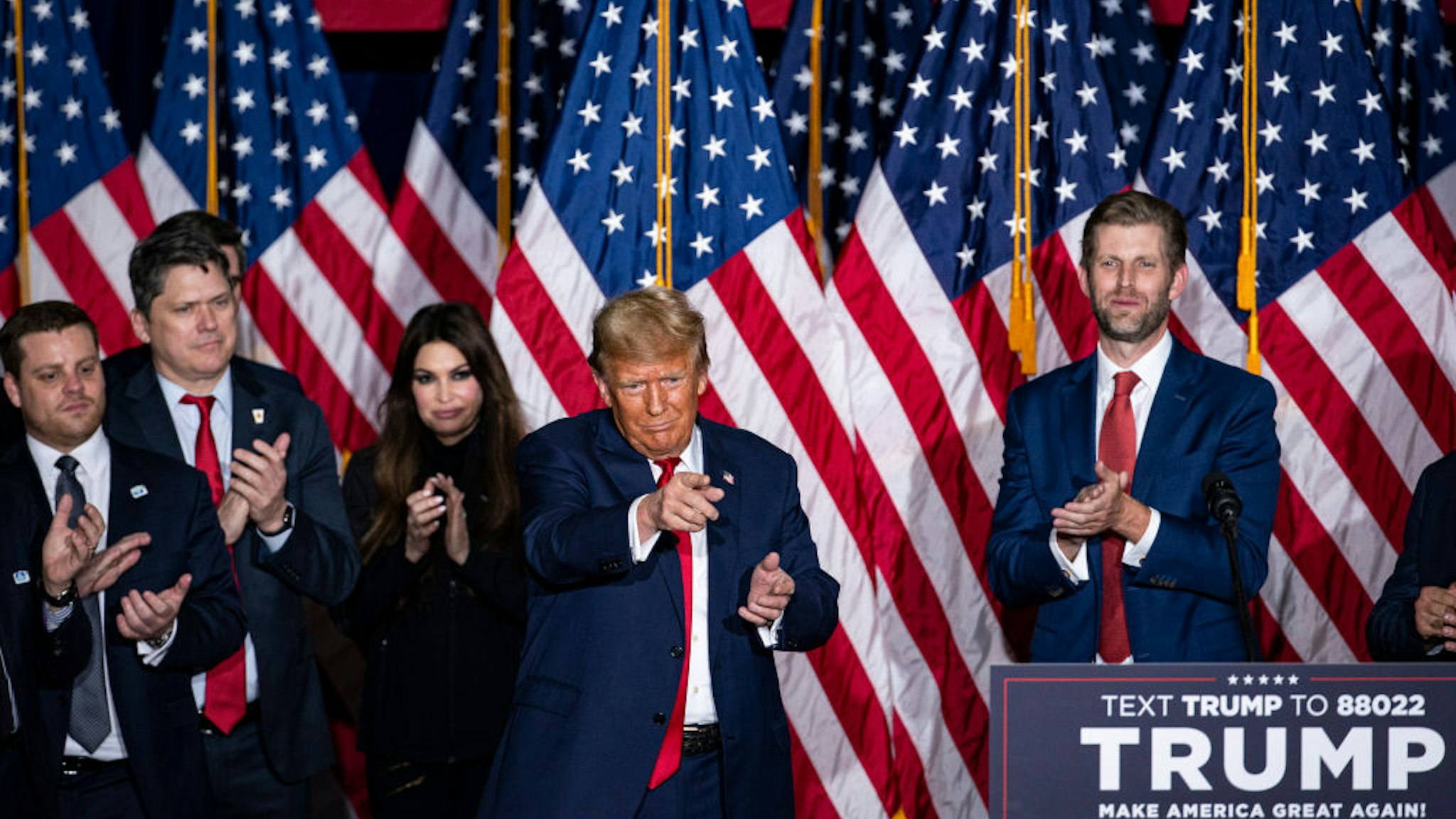 Former US President Donald Trump, second right, departs following a caucus night watch party in Des Moines, Iowa, US, on Monday, Jan. 15, 2024. Trump cruised to victory in the Iowa caucus, warding off a late challenge from rivals Ron DeSantis and Nikki Haley and cementing his status as the clear Republican frontrunner in the race. Photographer: Al Drago/Bloomberg via Getty Images