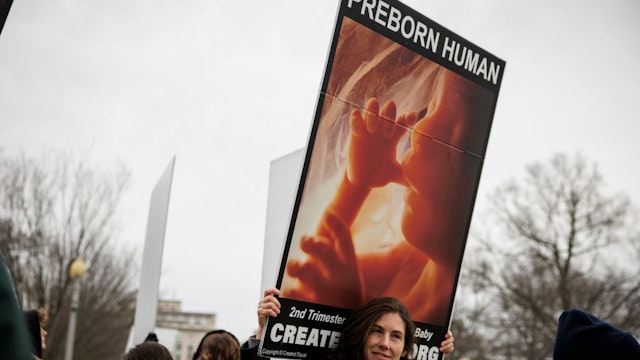 WASHINGTON, DC - JANUARY 18: Members of The Christian Defense Coalition hold a small anti-abortion demonstration in front of the White House on January 18, 2024 in Washington, DC. The annual anti-abortion demonstration March for Life will take place in Washington, DC, tomorrow, January 19. (Photo by Samuel Corum/Getty Images)