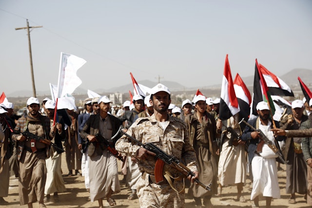 SANA'A, YEMEN - FEBRUARY 4: Houthi fighters participate in a rally in support of Palestinians in the Gaza Strip, and the recent Houthi strikes on shipping in the Red Sea and Gulf of Aden on February 4, 2024, on the outskirts of Sana'a, Yemen. The rally comes amid U.S. and British strikes against 36 Houthi targets in Yemen on Saturday, the second day of major U.S. attacks following an attack on American troops last weekend that killed three U.S. soldiers at a remote post in Jordan just across the border with Iraq by fighters with links to Iran.