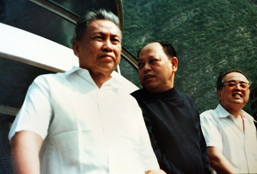 ANLONG VENG, CAMBODIA: An undated photo of genocidal leader Pol Pot (L) with former Khmer Rouge foreign minister Ieng Sary (C) recovered from the guerilla's former stronghold of Anlong Veng by Agence France-Presse reporter Reach Sambath on March 28 1998. The picture was believed to be taken in China in the late 1970's, according to Pich Chheang, former Khmer Rouge ambassador to China. Man on the right is unidentified. AFP PHOTO (Photo credit should read AFP via Getty Images)