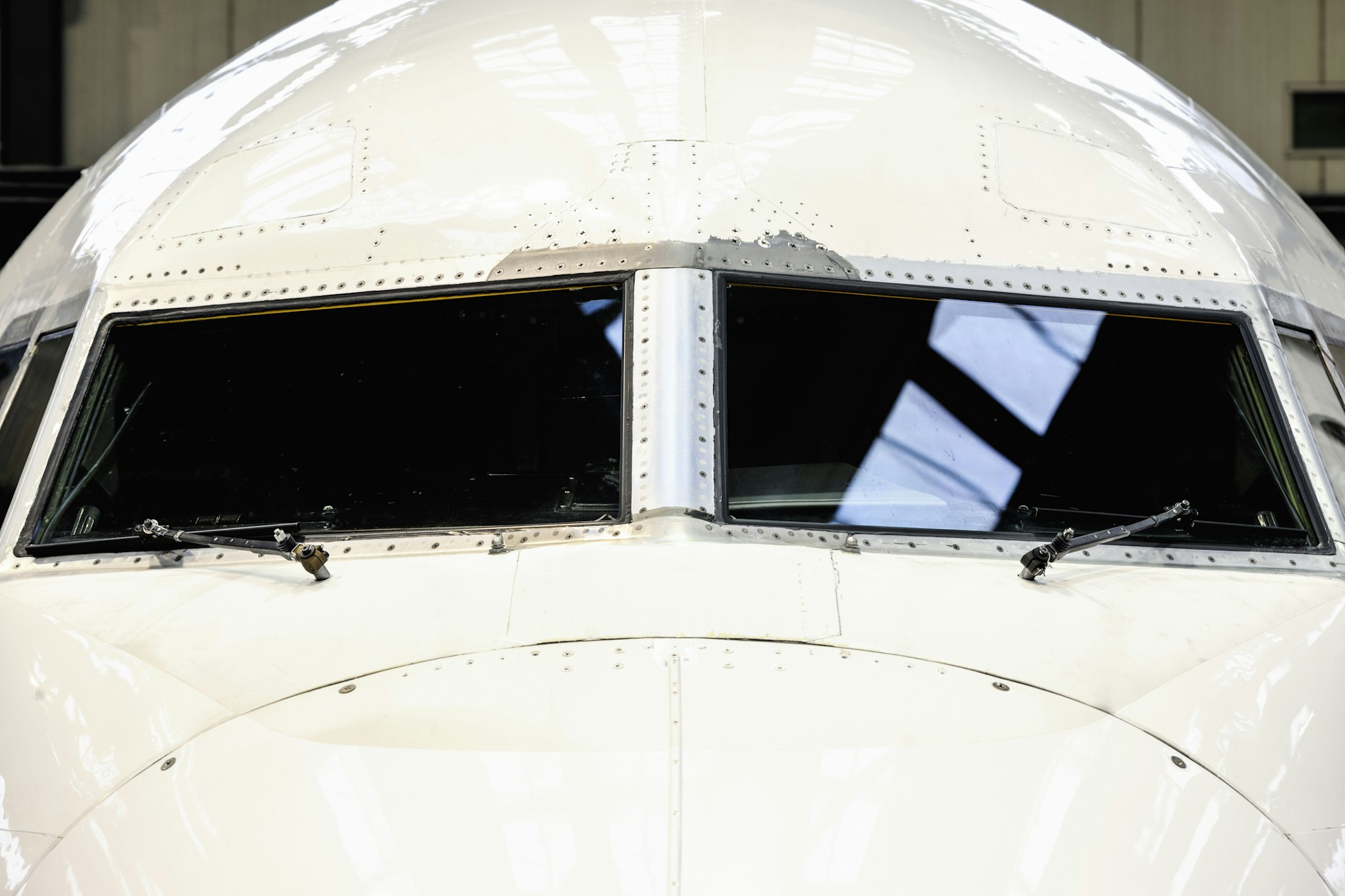 Cockpit windows of a Boeing B737 passenger jet.
