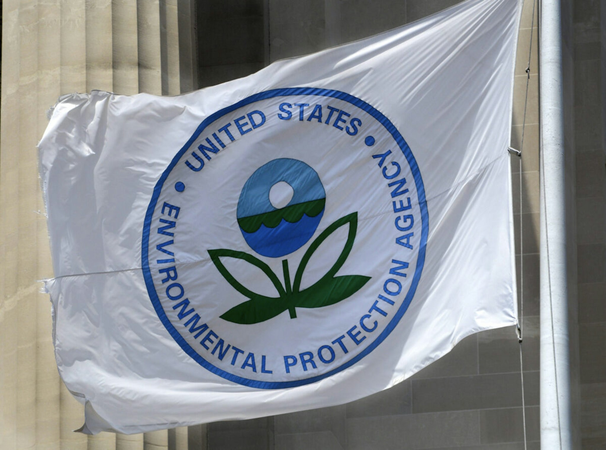 A flag with the United States Environmental Protection Agency (EPA) logo flies at the agency's headquarters in Washington, D.C.