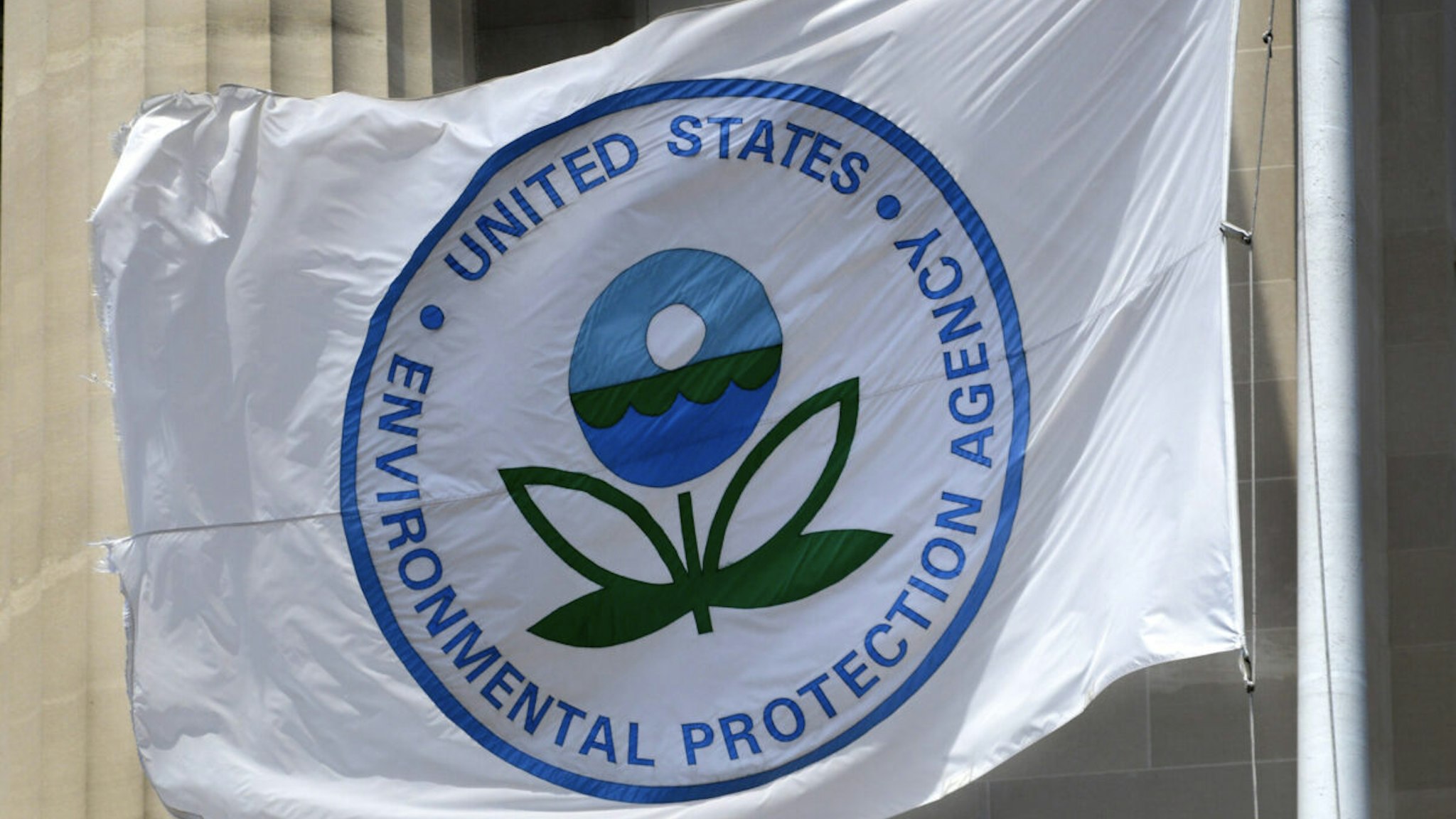 A flag with the United States Environmental Protection Agency (EPA) logo flies at the agency's headquarters in Washington, D.C.
