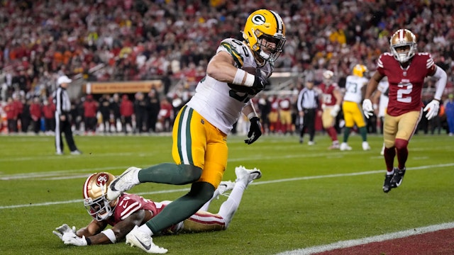 Tucker Kraft #85 of the Green Bay Packers scores a 2-yard receiving touchdown during the third quarter against the San Francisco 49ers in the NFC Divisional Playoffs at Levi's Stadium on January 20, 2024 in Santa Clara, California.