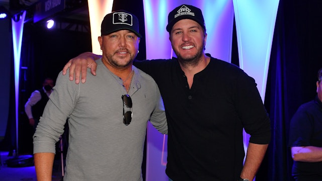 Singer Jason Aldean and singer Luke Bryan attend the 57th Academy Of Country Music Awards Radio Row at Park MGM on March 05, 2022 in Las Vegas, Nevada.