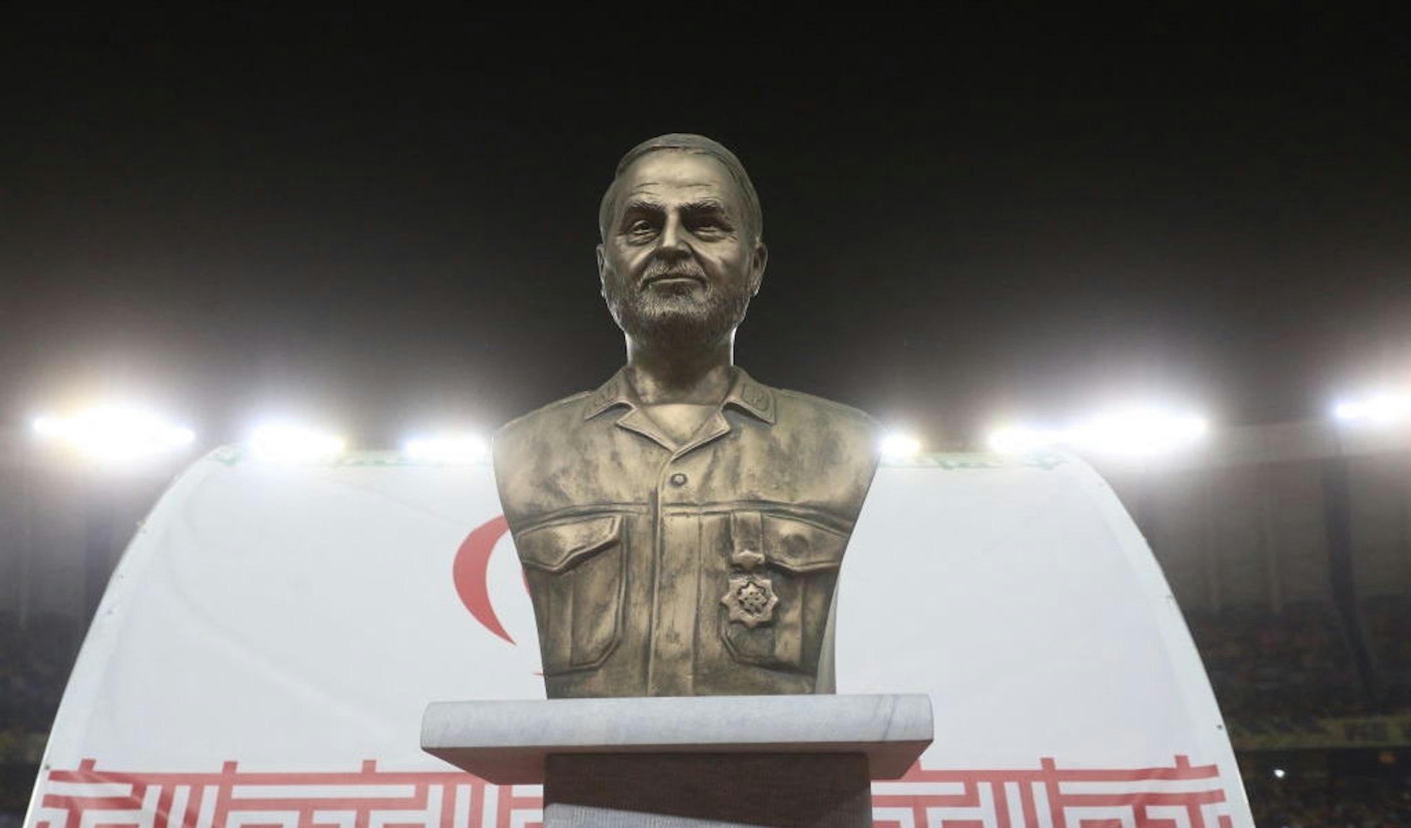 A bust of slain Iranian Revolutionary Guards (IRGC) commander Qasem Soleimani is displayed before the pitch at the Naghsh-e-Jahan Stadium in Isfahan during the AFC Champions League Group C football match between Iran's Sepahan and Saudi Arabia's Al-Ittihad on October 2, 2023. (Photo by MORTEZA SALEHI/TASNIM NEWS/AFP via Getty Images)