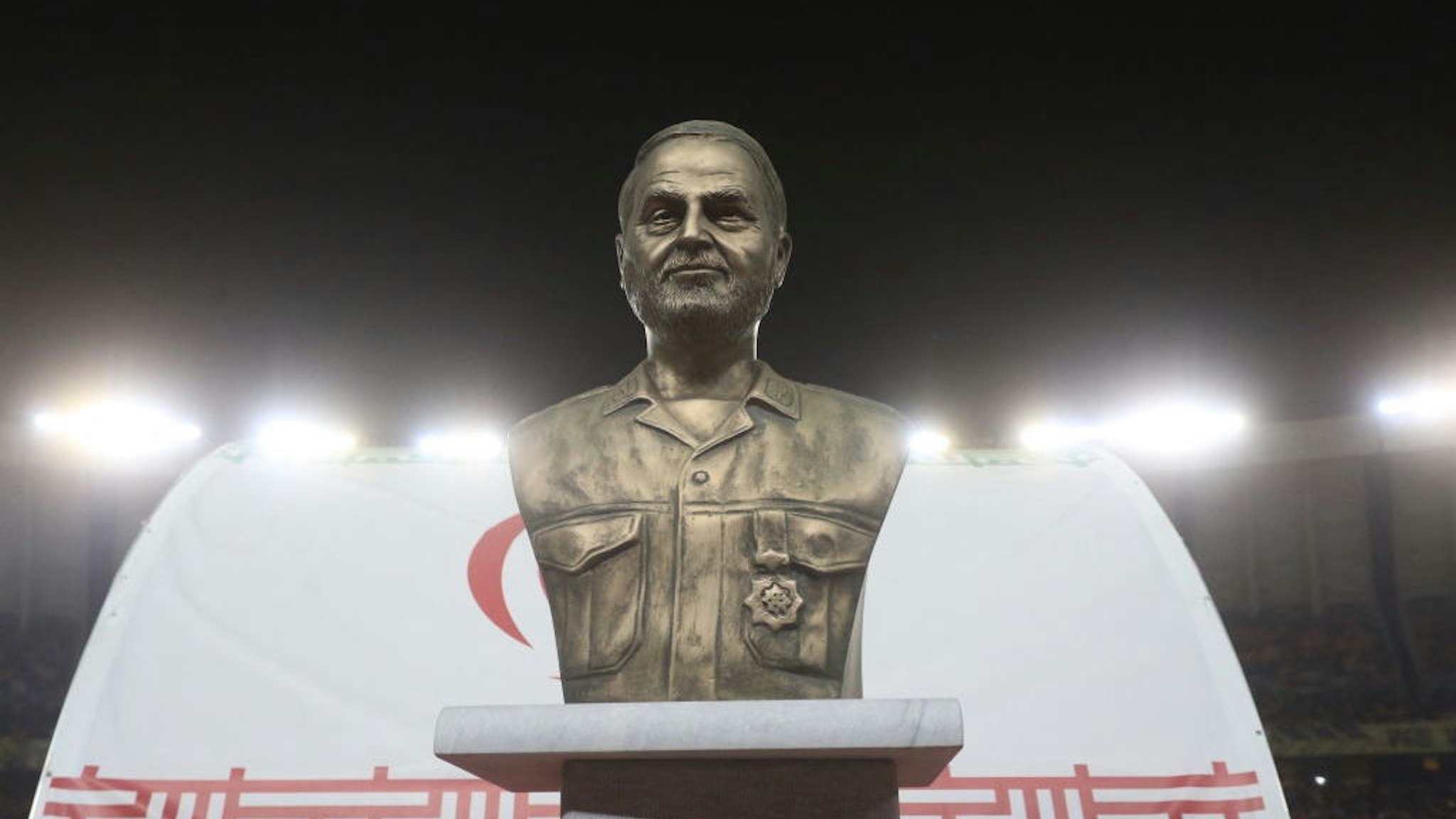 A bust of slain Iranian Revolutionary Guards (IRGC) commander Qasem Soleimani is displayed before the pitch at the Naghsh-e-Jahan Stadium in Isfahan during the AFC Champions League Group C football match between Iran's Sepahan and Saudi Arabia's Al-Ittihad on October 2, 2023. (Photo by MORTEZA SALEHI/TASNIM NEWS/AFP via Getty Images)