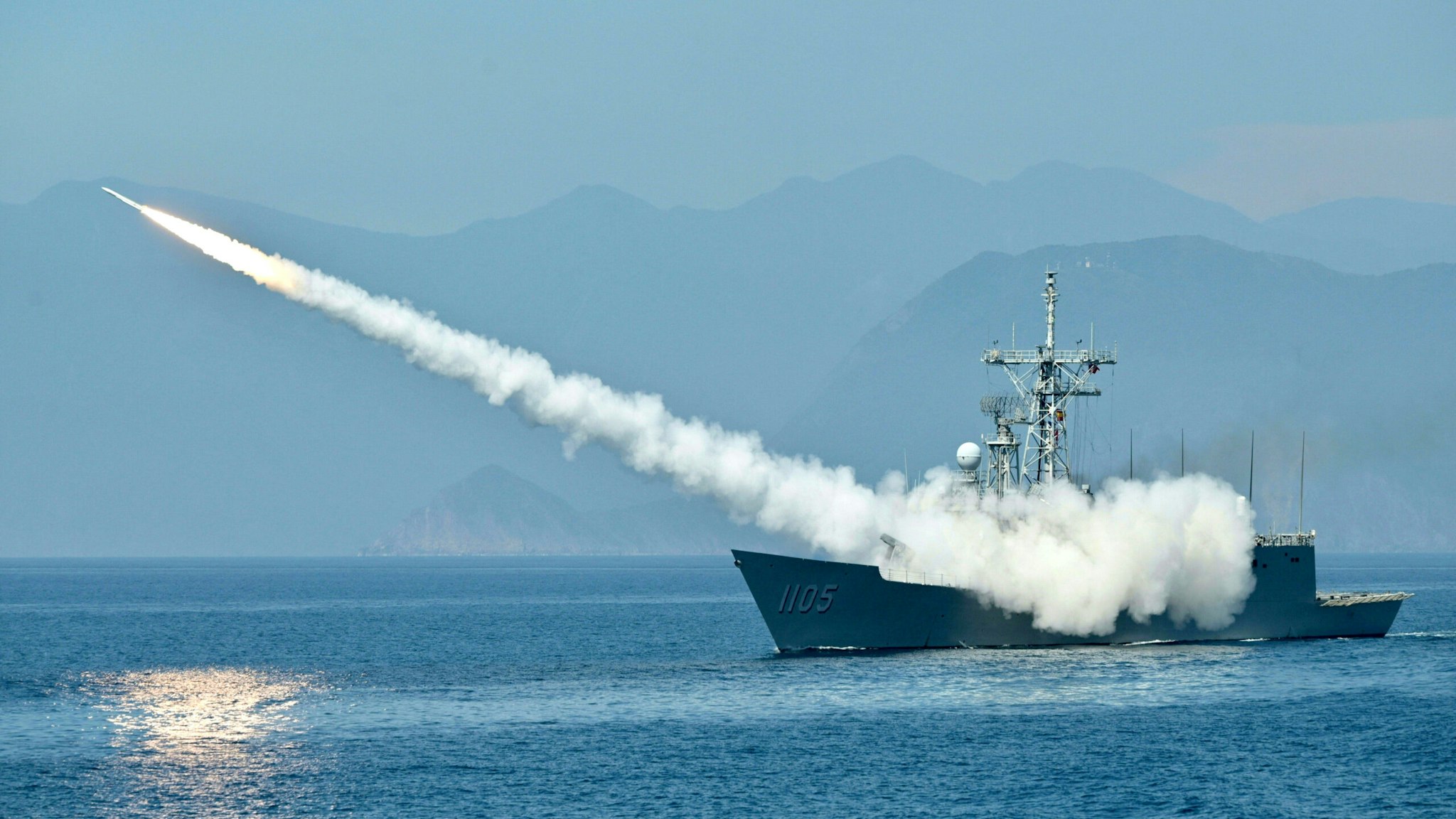 TOPSHOT - Taiwanese navy launches a US-made Standard missile from a frigate during the annual Han Kuang Drill, on the sea near the Suao navy harbor in Yilan county on July 26, 2022.