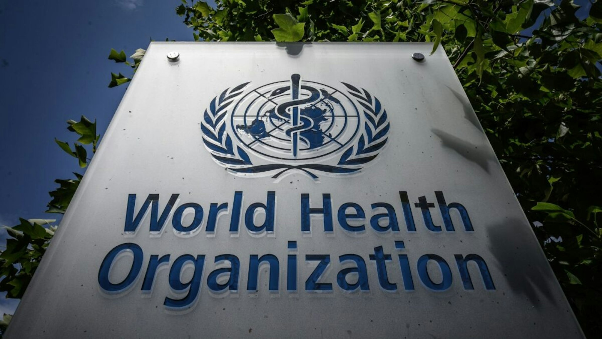 This photograph taken on July 3, 2020, shows a sign of the World Health Organization (WHO) at their headquarters in Geneva, amidst the COVID-19 outbreak, caused by the novel coronavirus.
