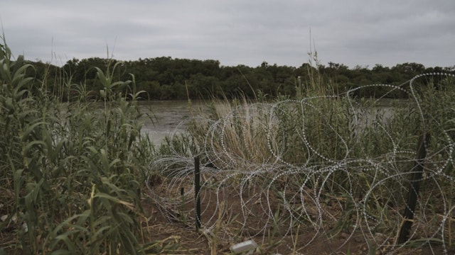 Razor wire fence near the Rio Grande River in Texas.