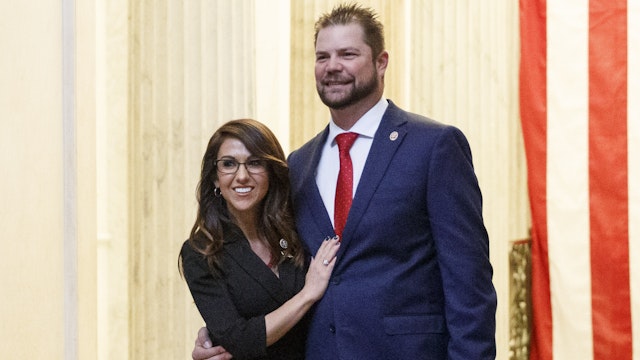 Representative-elect Lauren Boebert, a Republican from Colorado, left, stands for a photograph with her husband Jayson Boebert at the U.S. Capitol in Washington, D.C., U.S., on Sunday, Jan. 3, 2021. The 117th Congress is set to begin today with the election of the speaker of the House and administration of the oath of office for lawmakers in both chambers, procedures that will be modified to account for Covid-19 precautions.