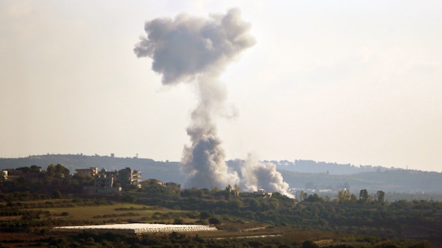 Smoke rises following an Israeli airstrike in Tayr Harfa, Lebanon, on Dec. 18, 2023. A Hezbollah fighter was killed and a civilian injured on Monday in confrontations on the Lebanon-Israel borders, according to Lebanese military sources.