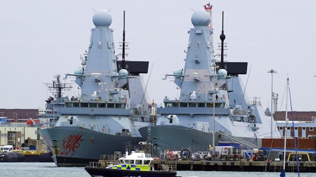 Two of the Royal Navy's Type 45 destroyers, HMS Dragon (left) and HMS Duncan, in Portsmouth Harbour. All six of the Royal Navy's state-of-the-art ships are currently docked in port at a time of heightened tensions with Russia. Picture date: Monday February 7, 2022.